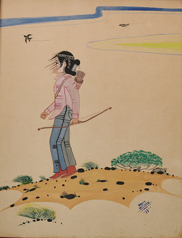 Young Navajo boy hunting in desert