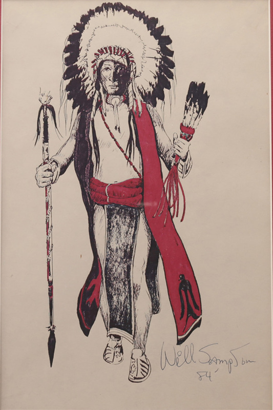 Self portrait with headdress and spear