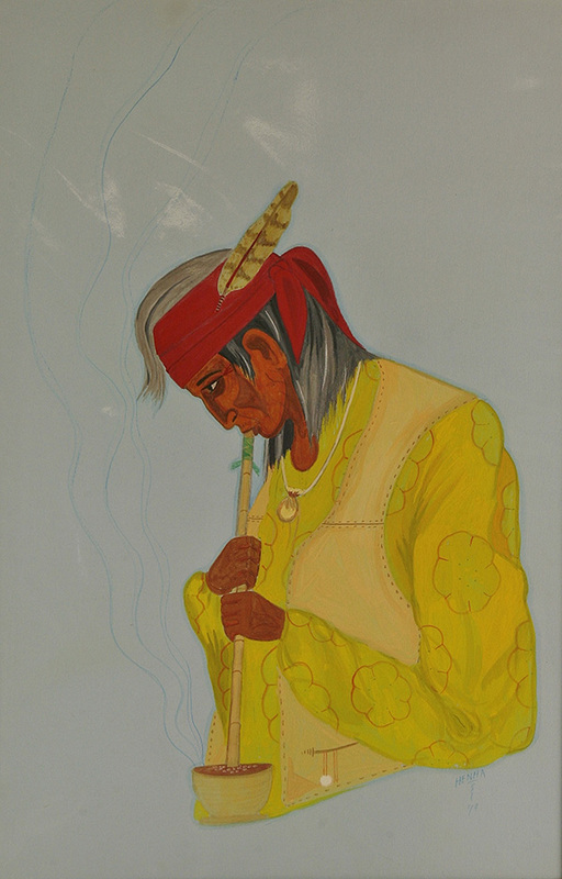 Man smoking ceremonial pipe