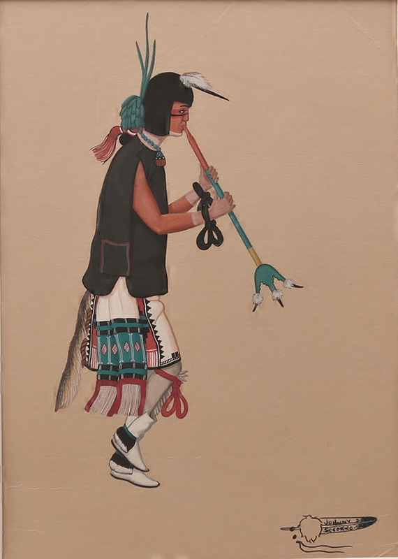 Navajo dancer holding whistle