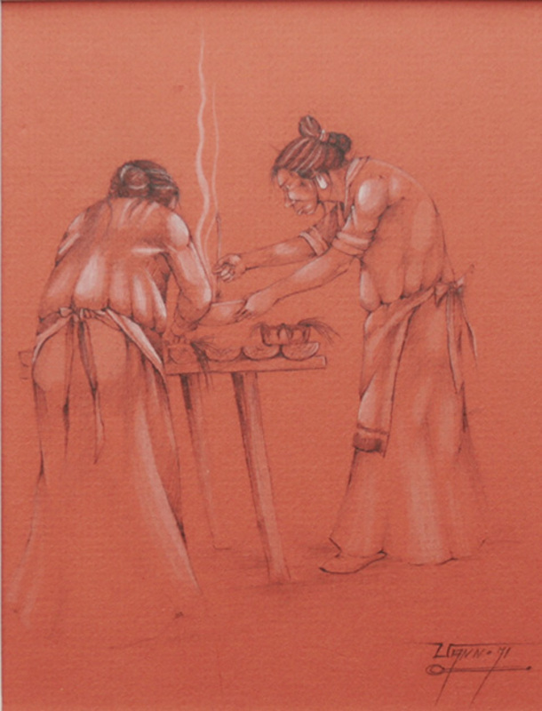 Two women cooking food